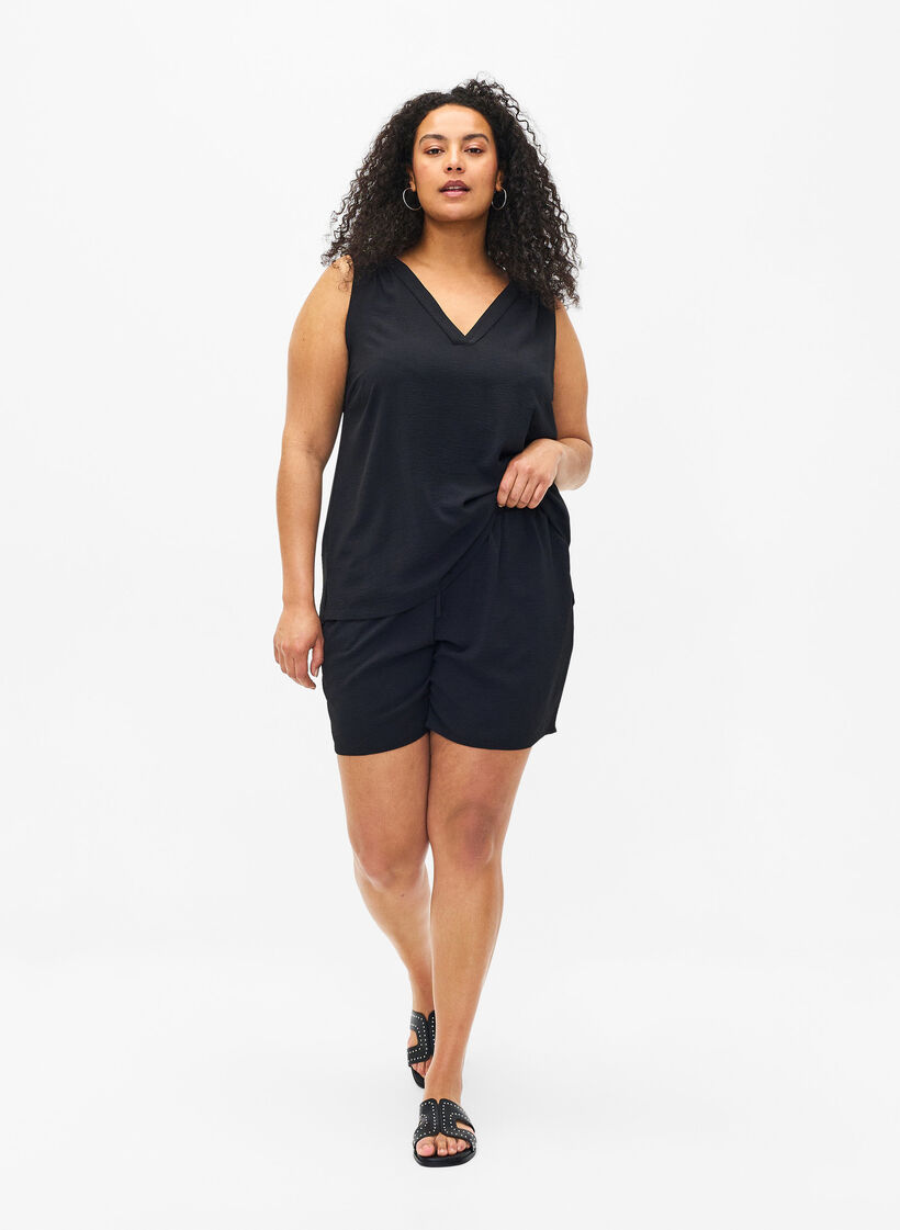 Korte broek met zakken en elastische tailleband, Zwart, Model image number 1