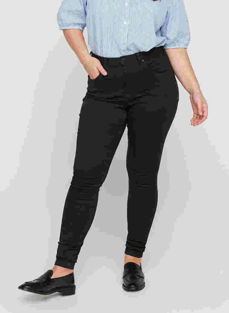 Super slim fit Amy jeans met hoge taille, Black, Model image number 4