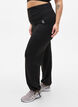 Losvallende trainingsbroek met trekkoord, Black, Model image number 0