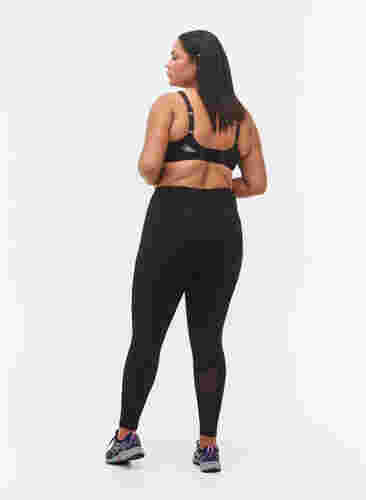 CORE, POCKET TIGHTS - Sport legging met mesh, Black, Model image number 1