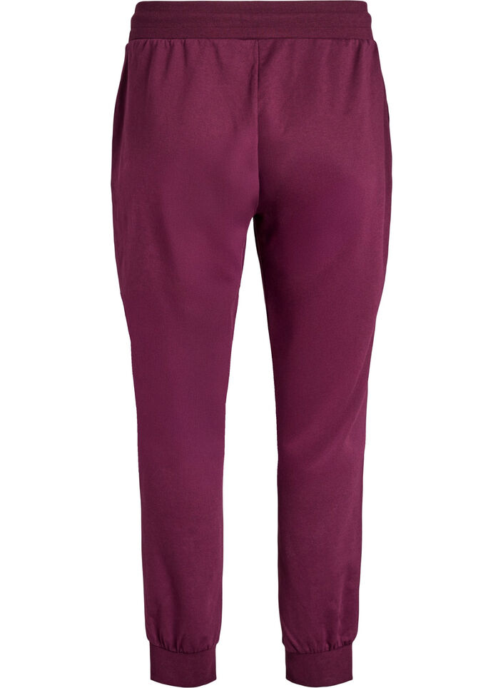 Losse trainingsbroek met zakken, Rood, Packshot image number 1