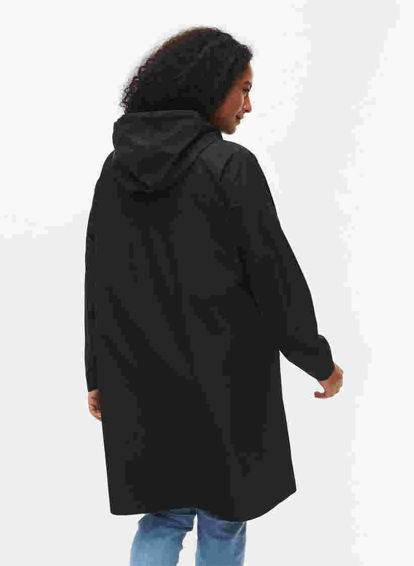 Regenjas met zakken en capuchon, Black, Model image number 1