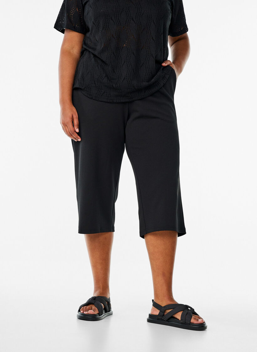 FLASH - Hoog getailleerde kniebroek met losse pasvorm, Zwart, Model image number 3