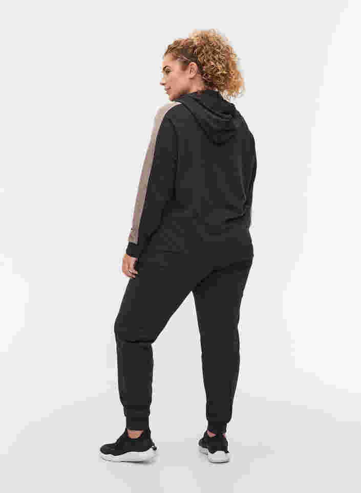 Losse sweatpants met zakken, Black, Model image number 1