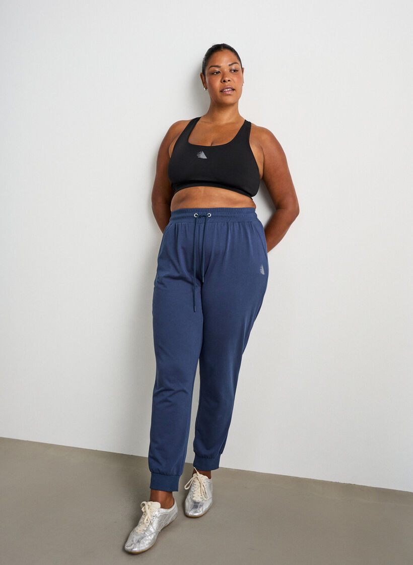 Losse trainingsbroek met zakken, Blauw, Model image number 0