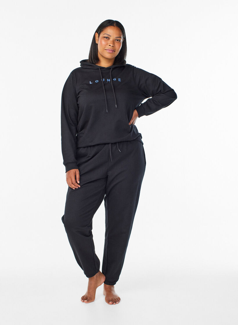 Trainingsbroek met zakken, Zwart, Model image number 0