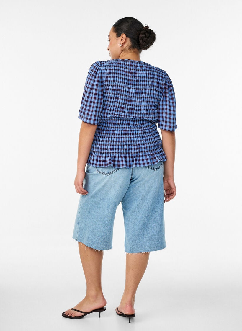 Gecropte jeans met een versleten look en rafelige randen, Blauw, Model