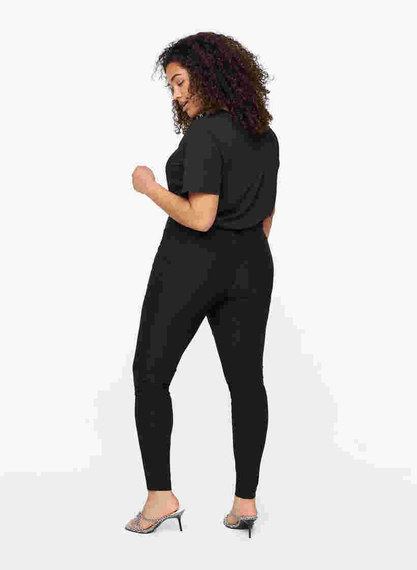 Nauwsluitende broek met rits details, Black, Model image number 1