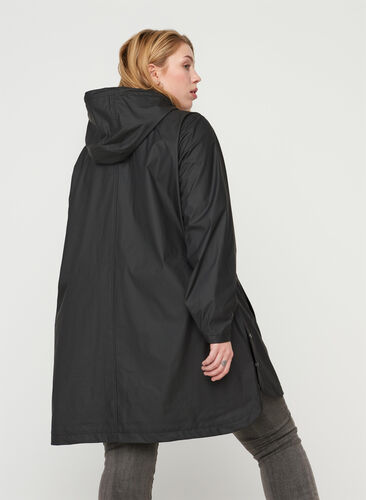 Regenjas met capuchon en zakken, Black, Model image number 1