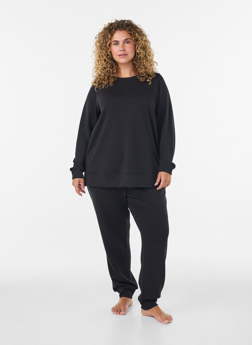 Jersey blouse met lange mouwen en een ronde hals, Zwart, Model image number 1
