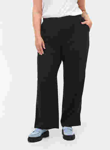 Flared broek met elastiek in de taille, Black, Model image number 2