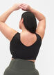 CORE, MID SUPPORT SPORTS BRA - Sportbeha in blokkleur met v-rug, Black, Model image number 1