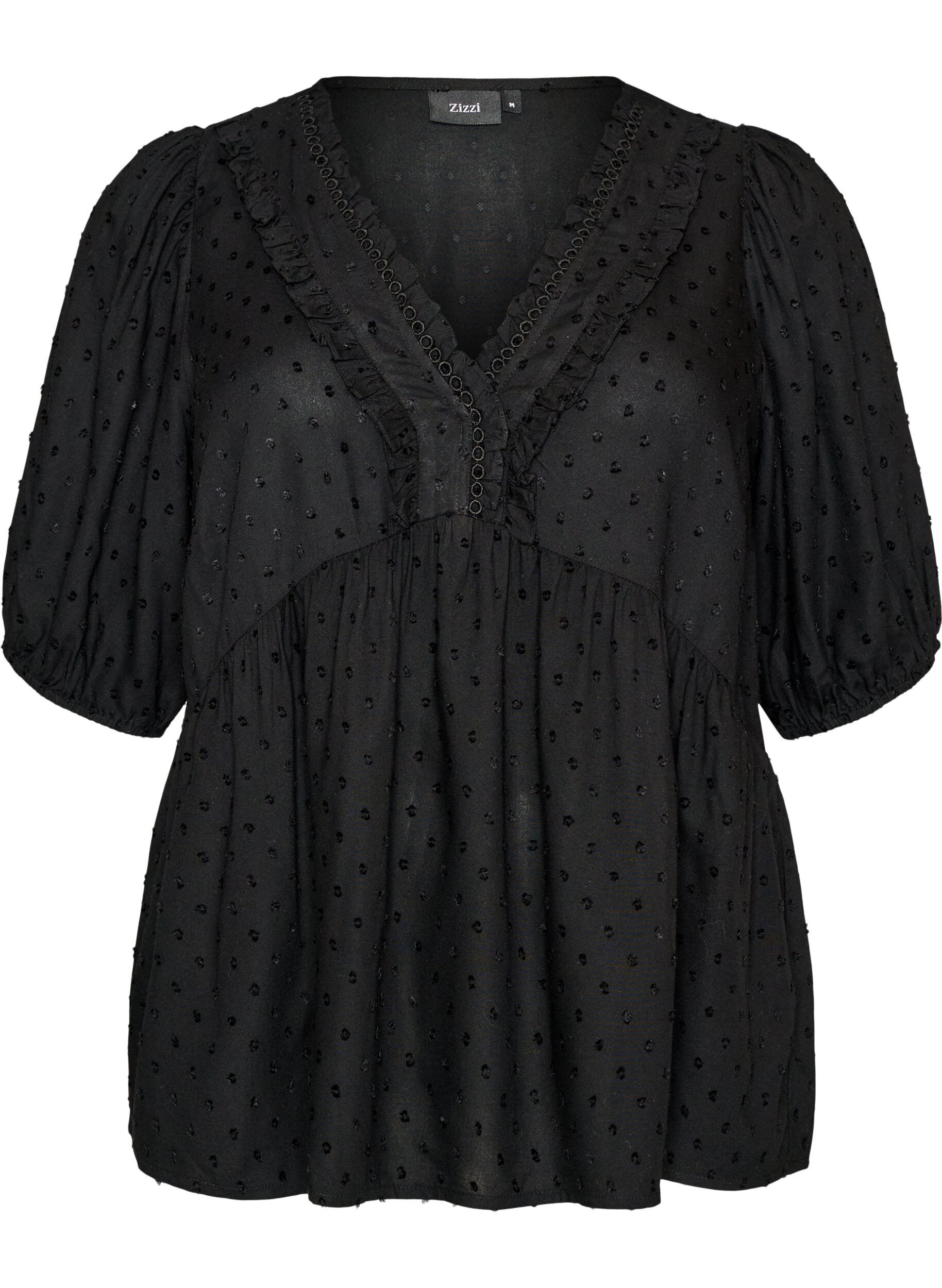 Viscose blouse met een stippenstructuur en V-hals