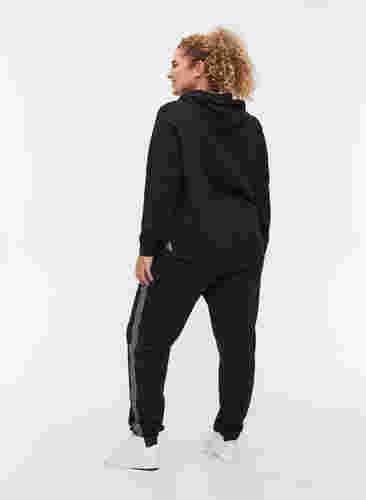 Sweatbroek met trekkoord en zakken, Black, Model image number 1