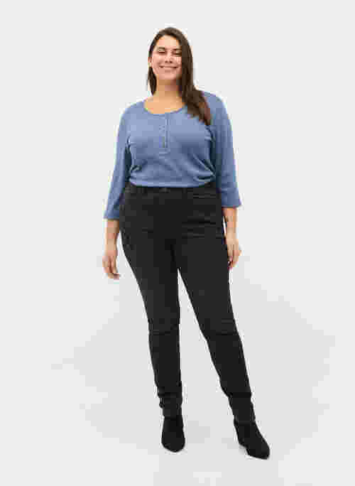 Super slim Amy jeans met split en knopen