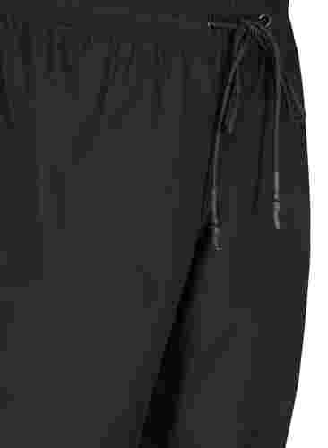 Regenbroek met elastiek en trekkoorden, Black, Packshot image number 2