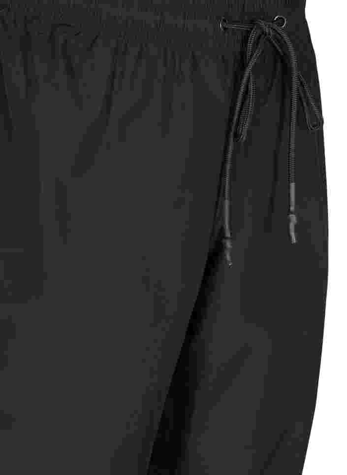 Regenbroek met elastiek en trekkoorden, Black, Packshot image number 2