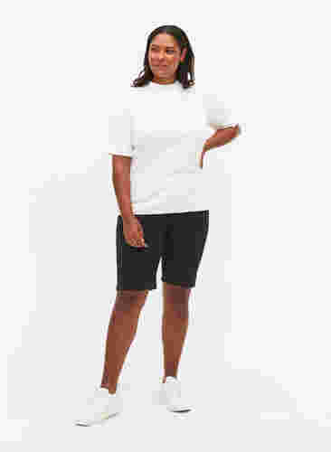 Shorts met strakke pasvorm en achterzakken, Black, Model image number 3