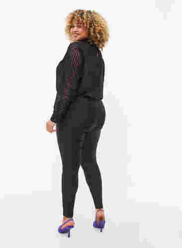 Glimmende legging met achterzakken 7/8 lengte, Black, Model image number 1