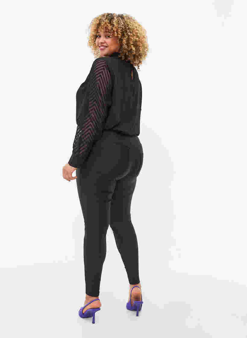 Glimmende legging met achterzakken 7/8 lengte, Black, Model image number 1