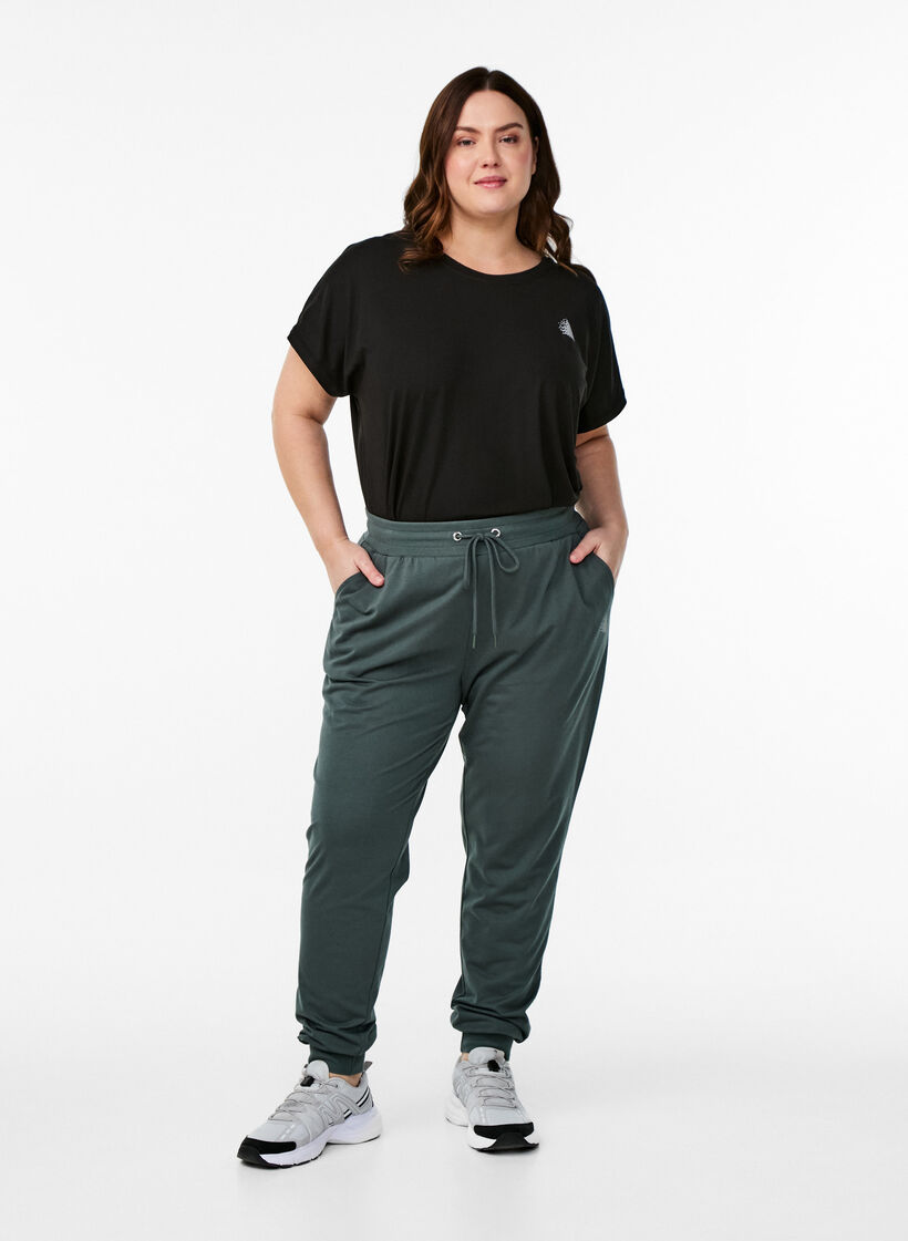 Losse trainingsbroek met zakken, Groen, Model image number 0