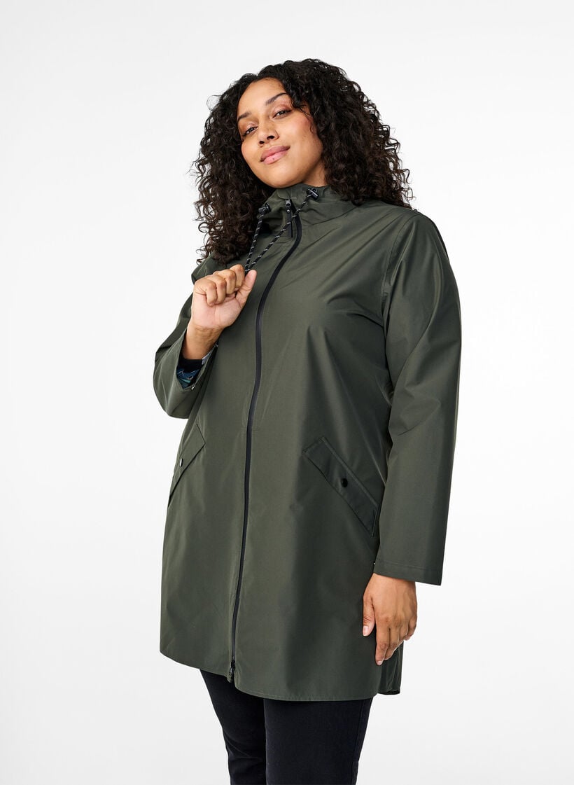 Regenjas met zakken en capuchon, Groen, Model image number 0