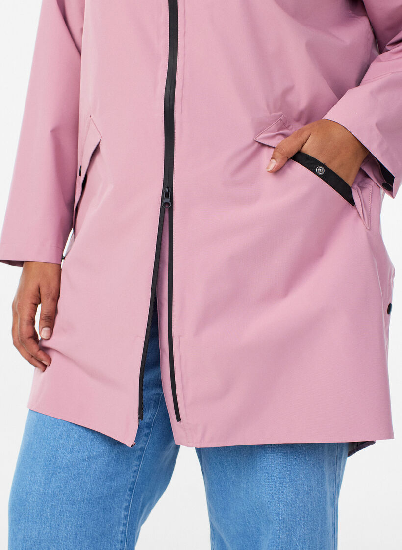 Regenjas met zakken en capuchon, Roze, Model