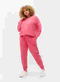 Sweatbroek met print en zakken, Hot Pink AOP, Model