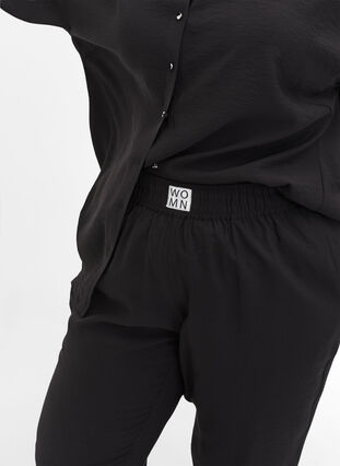 Losse viscose broek met elastische boorden en zakken, Black, Model image number 3