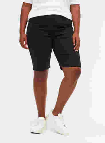 Shorts met strakke pasvorm en achterzakken, Black, Model image number 2