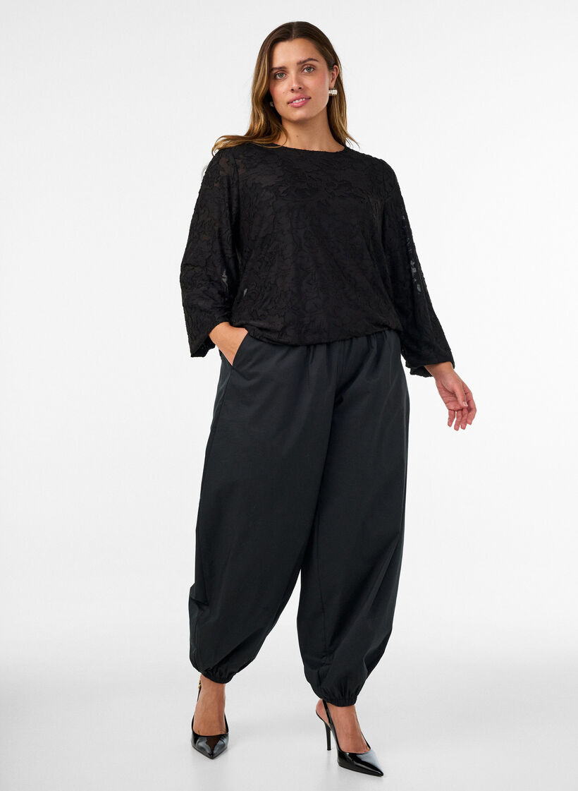 Doorschijnende blouse met bloemenstructuur en lange mouwen, Zwart, Model image number 1