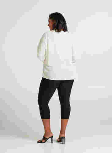 Nauwsluitende driekwart broek met rits, Black, Model image number 1