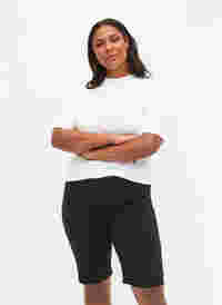 Shorts met strakke pasvorm en achterzakken, Black, Model